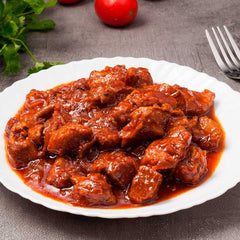 Estofado de Cerdo en Salsa de Tomate y Pimientos
